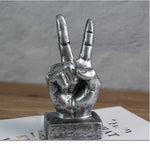 Hand sign ornament