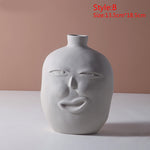 Upset human face vase