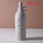 Upset human face vase