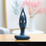 Praying ceramic statuette